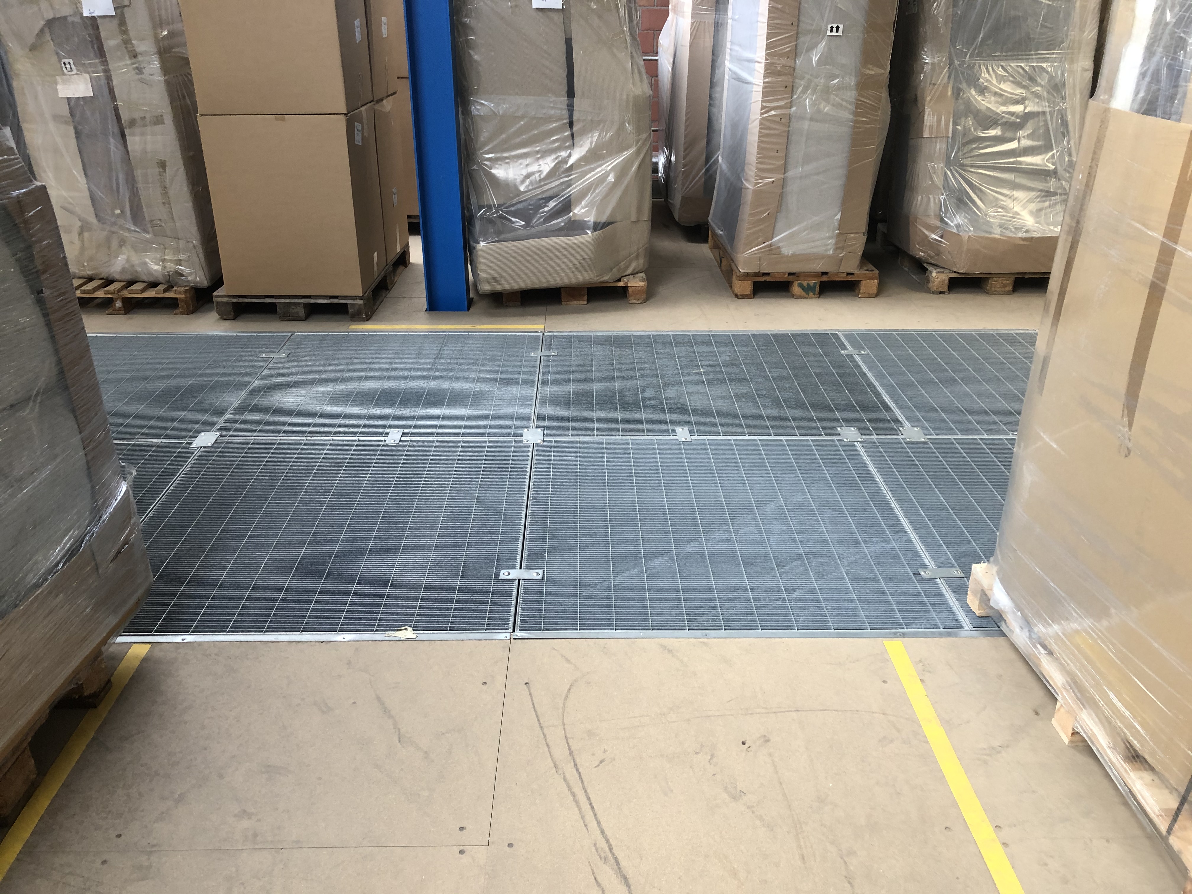 Metal ramp grids in storage